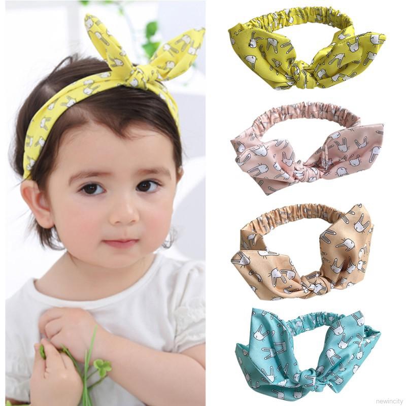 Băng đô nơ chấm bi dễ thương cho bé gái