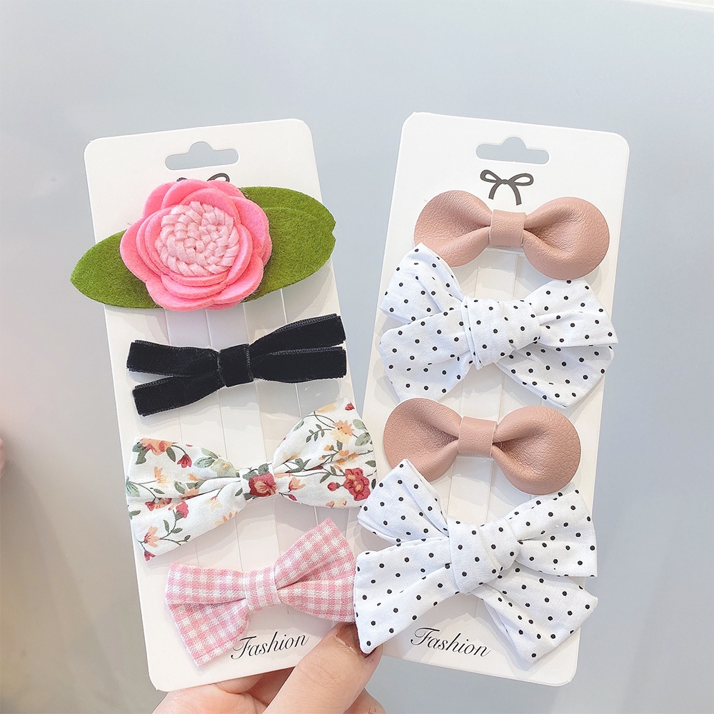 Set 4 Kẹp tóc KIDSBOWS hình nơ/bông hoa dễ thương thời trang cho bé gái