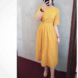 Đầm bi vàng bo eo
