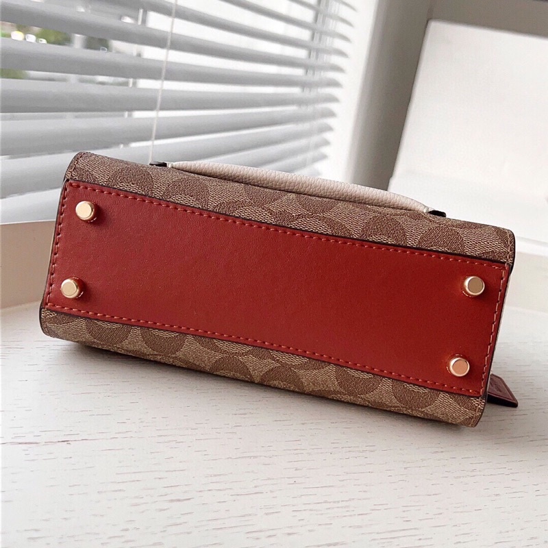 Túi cầm tay Coach Mini Lane