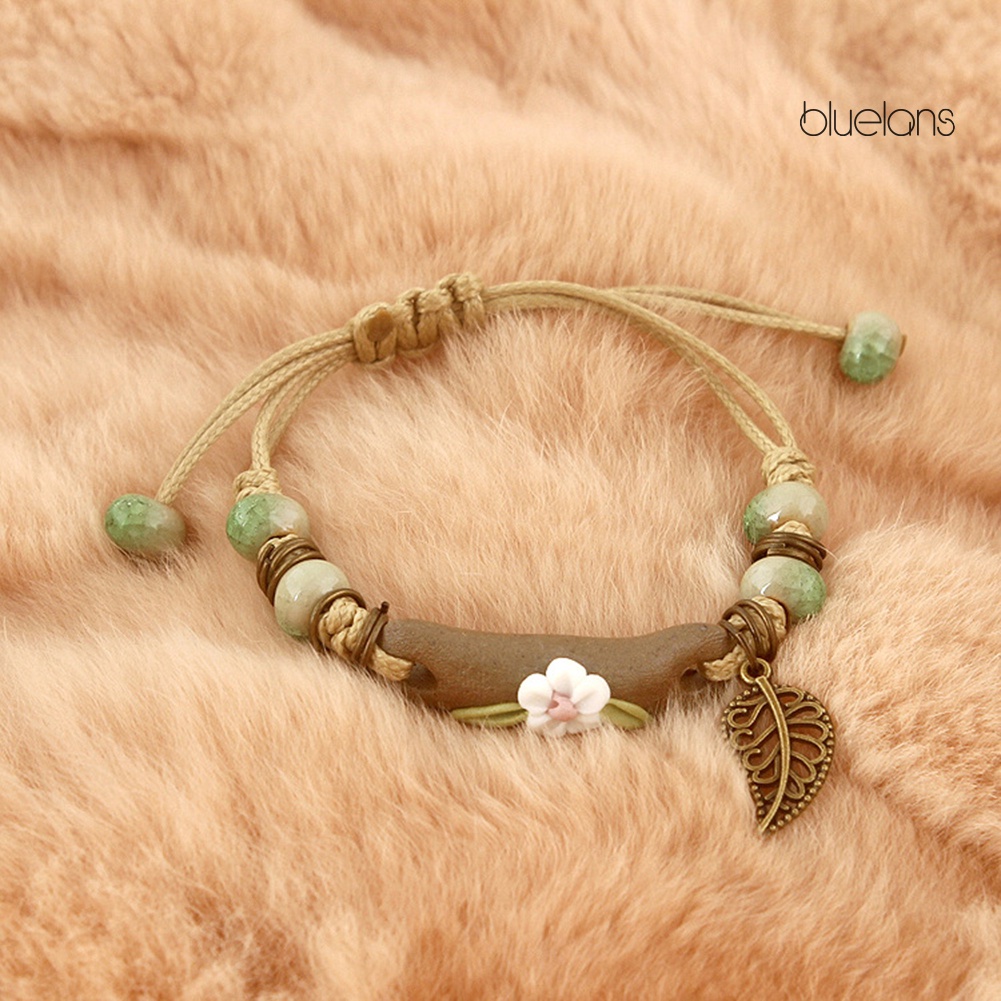 Vòng Tay Dây Bện Gắn Hoa Lá Sứ Thời Trang Cho Nữ