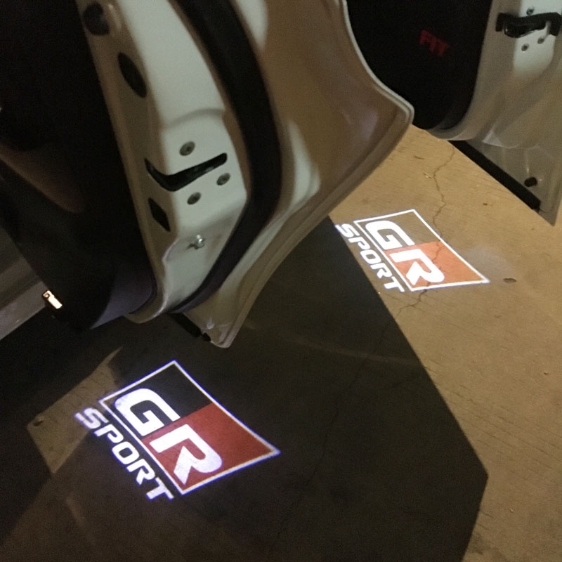 2 Đèn LED Chiếu Sáng Cửa Xe Hơi Cho Toyota GR VIos Yaris Corolla Cross Wish Revo CHR Avanza Fortuner Rush Wigo Innova