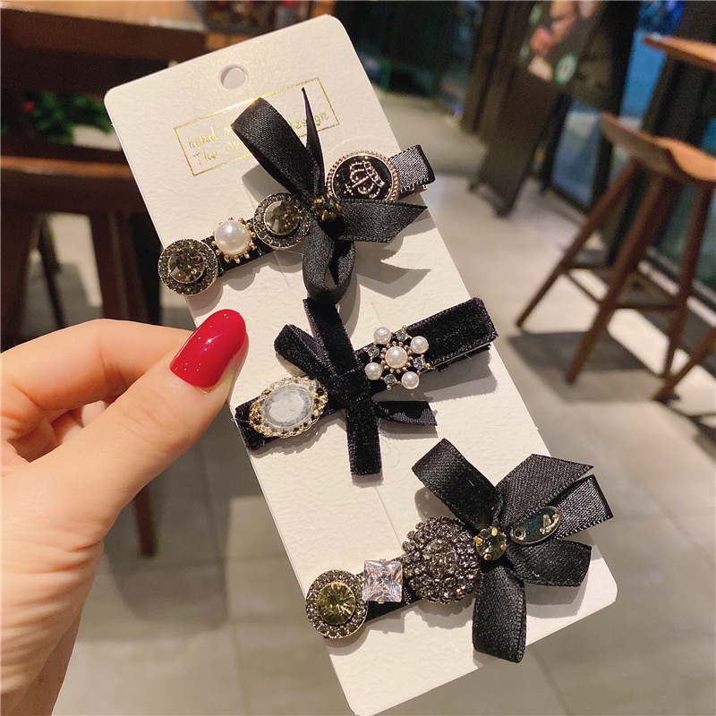 Kẹp tóc mái Hàn Quốc nơ đen đính đá nhiều kiểu dáng cực sang chảnh TB520