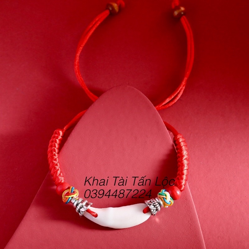 Vòng tay , lắc tay dây đỏ nanh chó mực trừ tà , bình an hộ mệnh