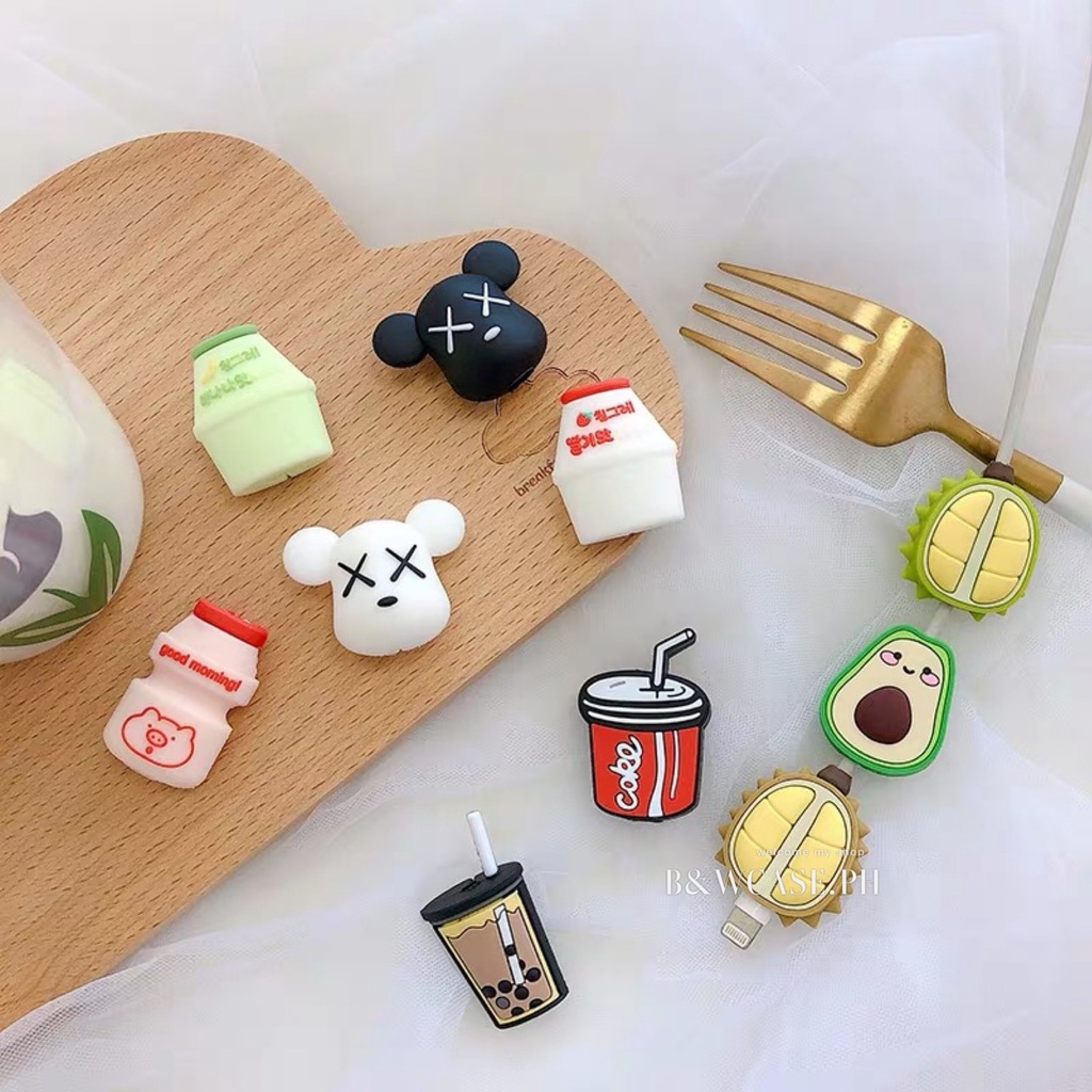 Phụ kiện bảo vệ đầu dây cáp sạc truyền dữ liệu thiết kế trái cây/ kaws/ nhiều mẫu khác hoạt hình đáng yêu cho iPhone