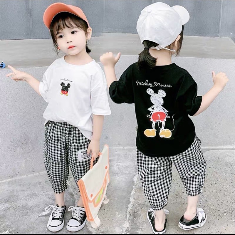 Bộ Bé Gái MicKey Mouse Trắng - Đen Phối Quần Kẻ Caro Lỡ Cho Bé -Nhà Cam