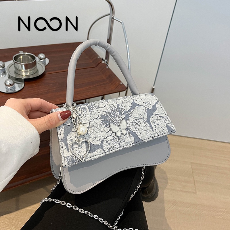 Túi đeo chéo, túi cầm tay NOON kèm phụ kiện độc đáo NB46