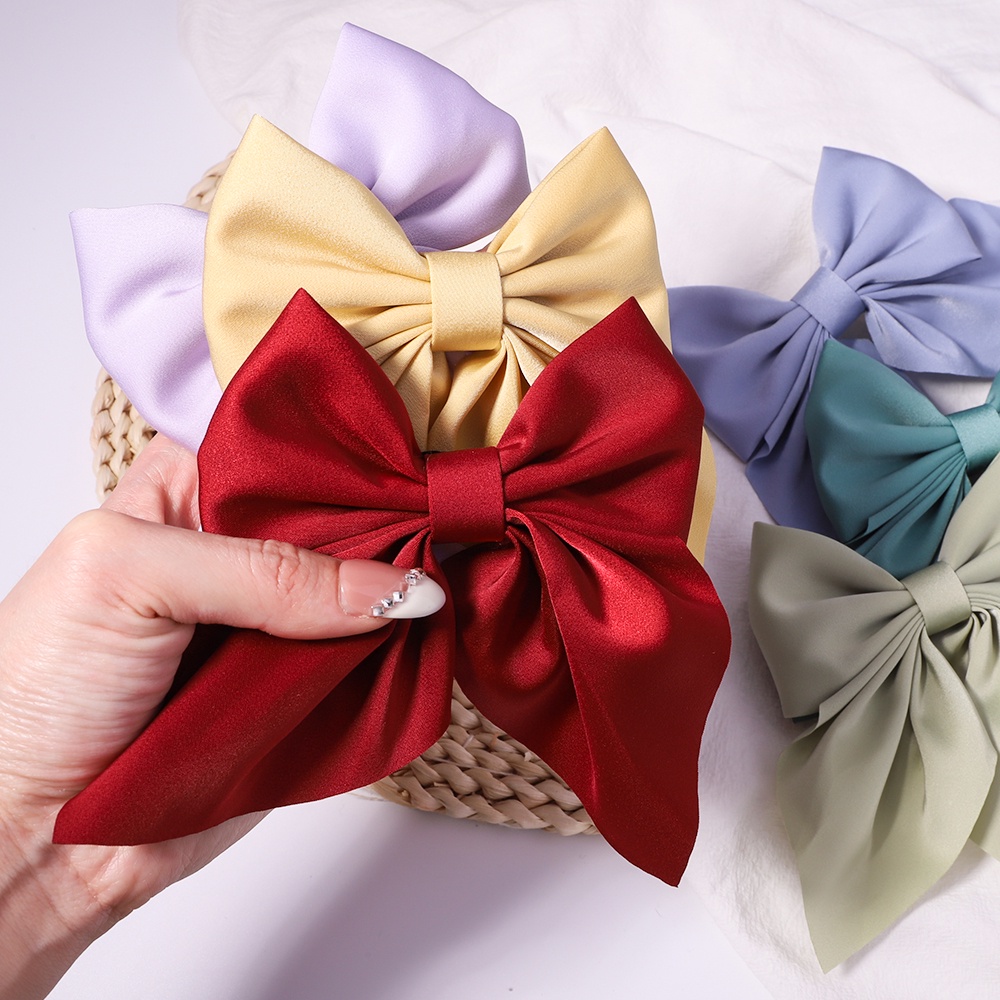 Kẹp tóc Kidsbows hình nơ satin màu trơn ngọt ngào cho bé gái
