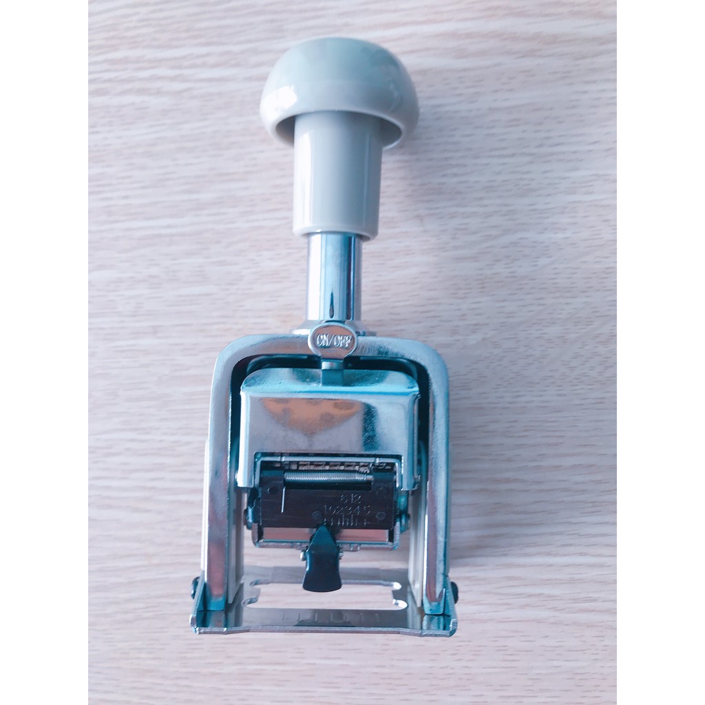 Máy đóng 6 số tự động Deli 7506
