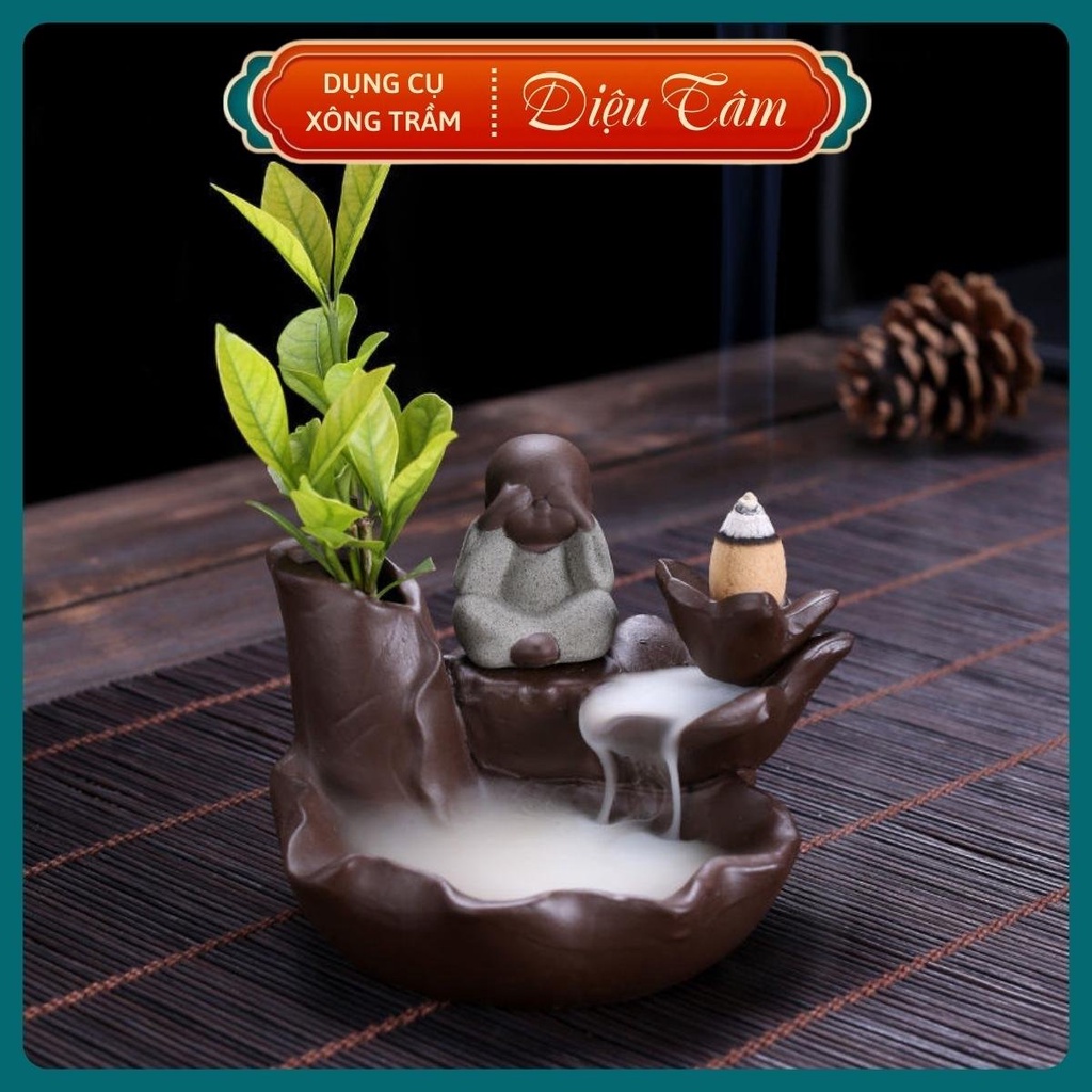 Tháp khói trầm hương hình chú tiểu, thác trầm hương đốt nụ trầm khói ngược thay cho lư đốt trầm Diệu Tâm