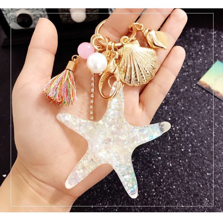 MÓC KHÓA SAO BIỂN DẠ QUANG