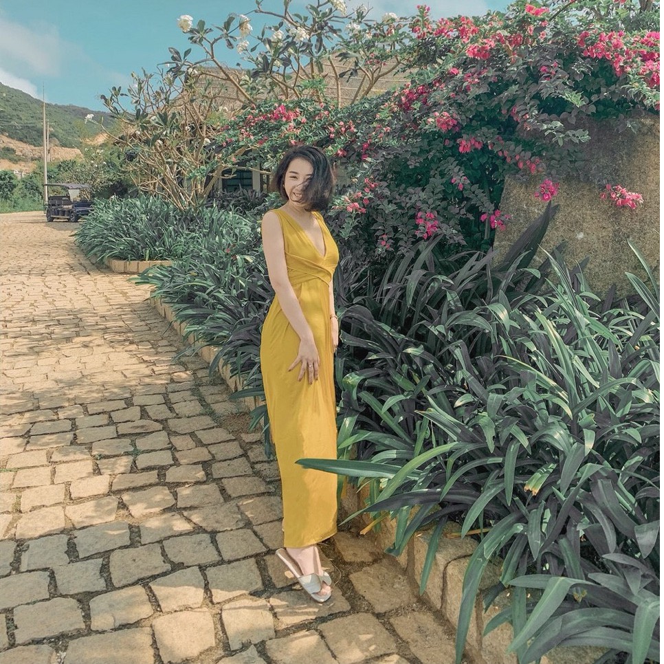 Đầm maxi cột nơ xẻ tà