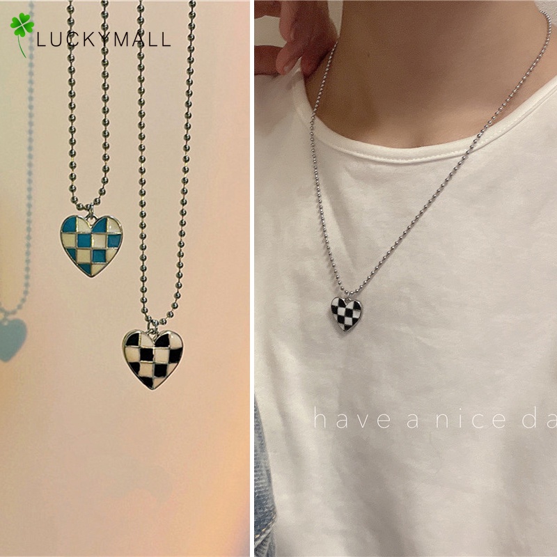 Dây chuyền hợp kim mặt hình trái tim khắc họa tiết bàn cờ cho nữ