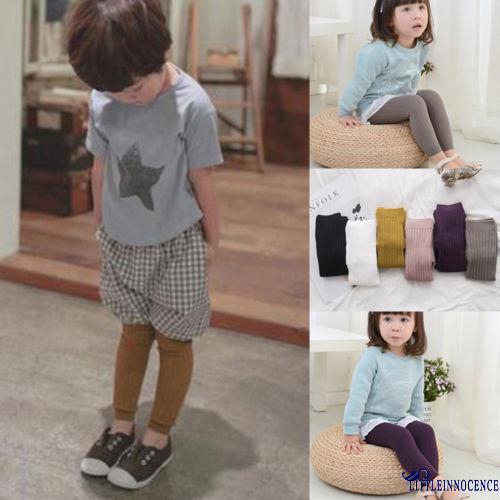 Quần tất thun gân màu trơn xinh xắn cho bé