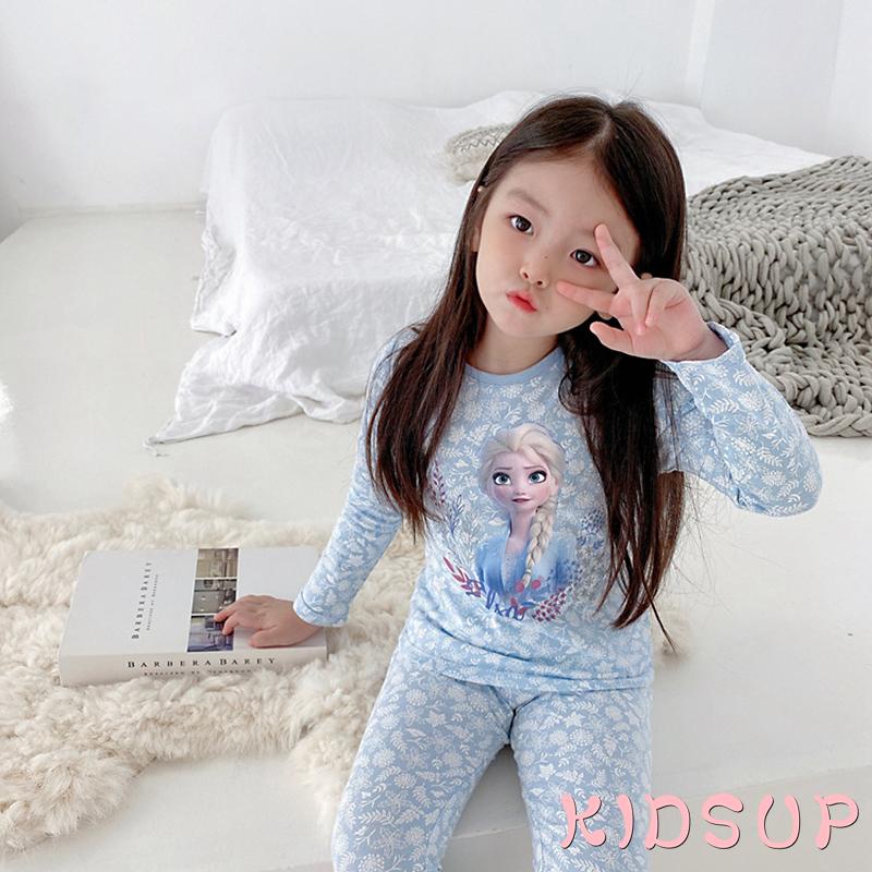Bộ đồ ngủ 2 món gồm áo tay dài cổ tròn in họa tiết hoạt hình + quần dài cho bé gái