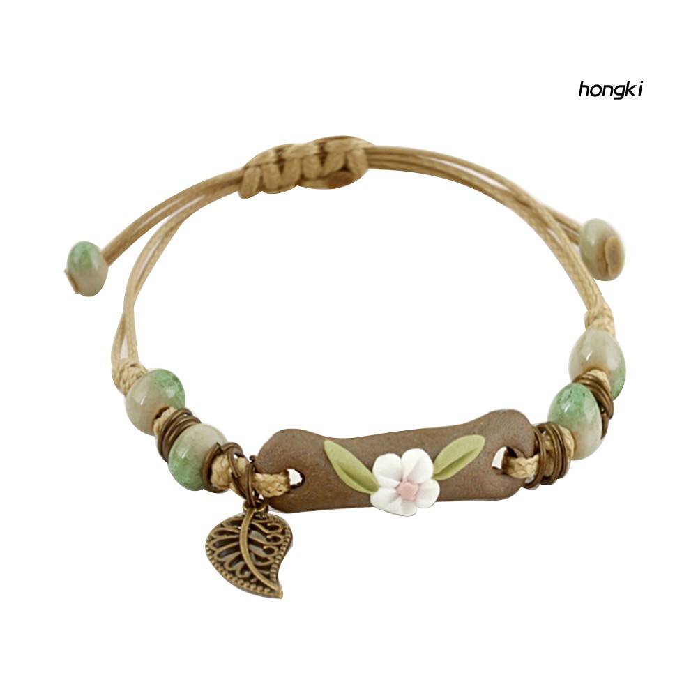 Vòng tay dây bện mặt hình hoa lá thời trang dành cho nữ