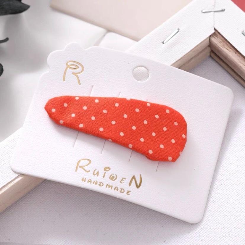 Kẹp tóc dài họa tiết chấm bi và kẻ cho bé gái