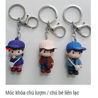 Móc khóa chú bé liên lạc