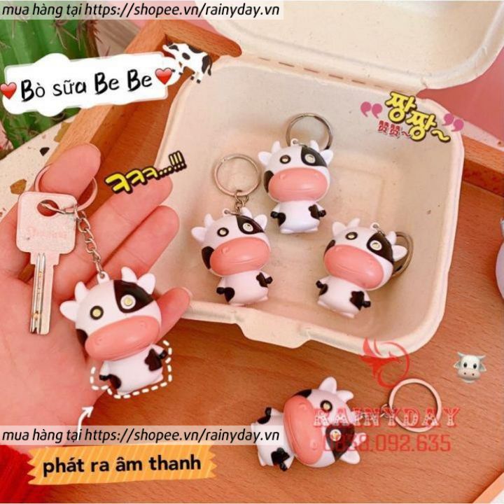 Móc khóa con bò sữa có đèn led phát nhạc treo xe máy balo cặp túi xách cute dễ thương