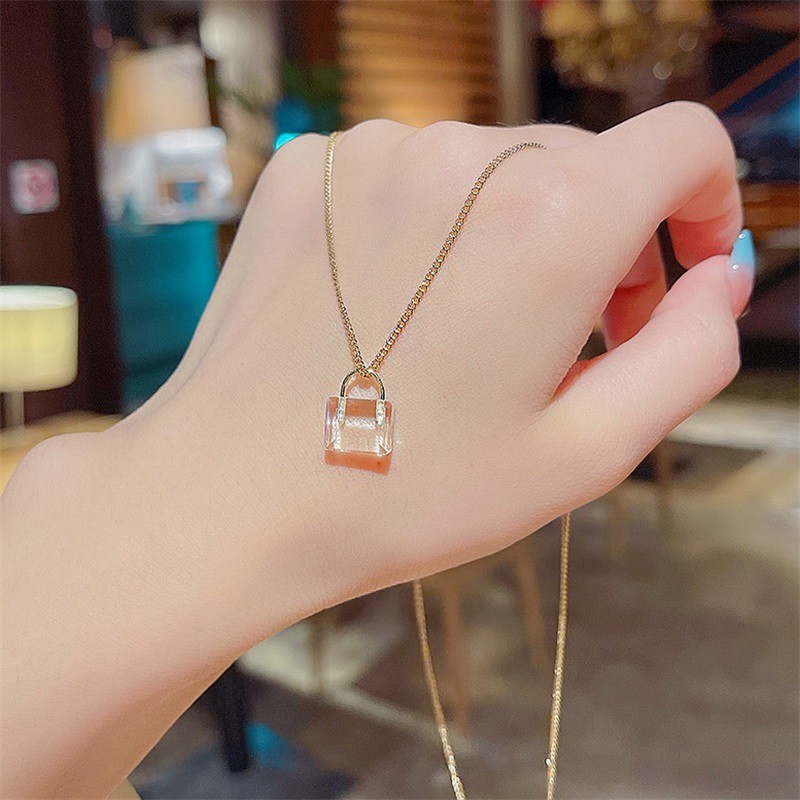 Vòng cổ mặt hình túi xách bằng thép titan đính pha lê