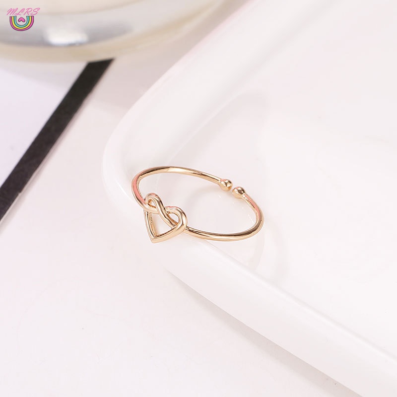Nhẫn hợp kim hình trái tim xoắn rỗng có thể điều chỉnh thời trang cho nữ