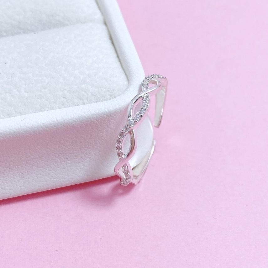 Nhẫn hở bạc ta kiểu xoắn đính đá, nhẫn nữ free size phong cách trẻ trung - Trang sức bạc Evasilver