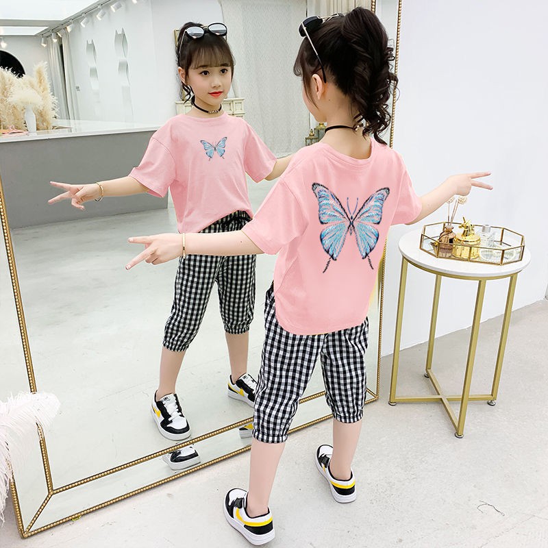 váy trẻ em▬○Bộ đồ cotton bé gái áo phông quần mùa hè lưới màu đỏ mới thời trang Hàn Quốc cô cắt tây trẻ em giả