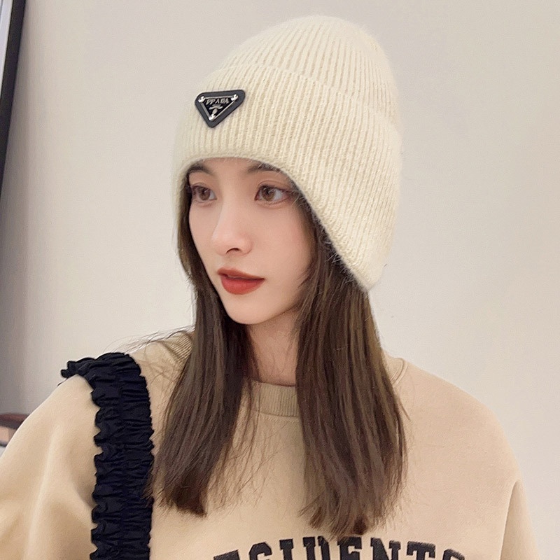 Mũ bảo vệ tai ấm áp của phụ nữ nam giới yêu thích nhãn tam giác mùa thu và mùa đông gió và bảo vệ lạnh áo pull dệt kim đi xe đạp ngoài trời boutique mũ len lông thỏ