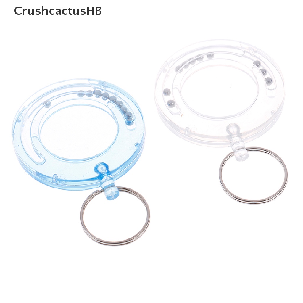 Móc khóa hình đồng xu với thiết kế mê cung ma trận thú vị