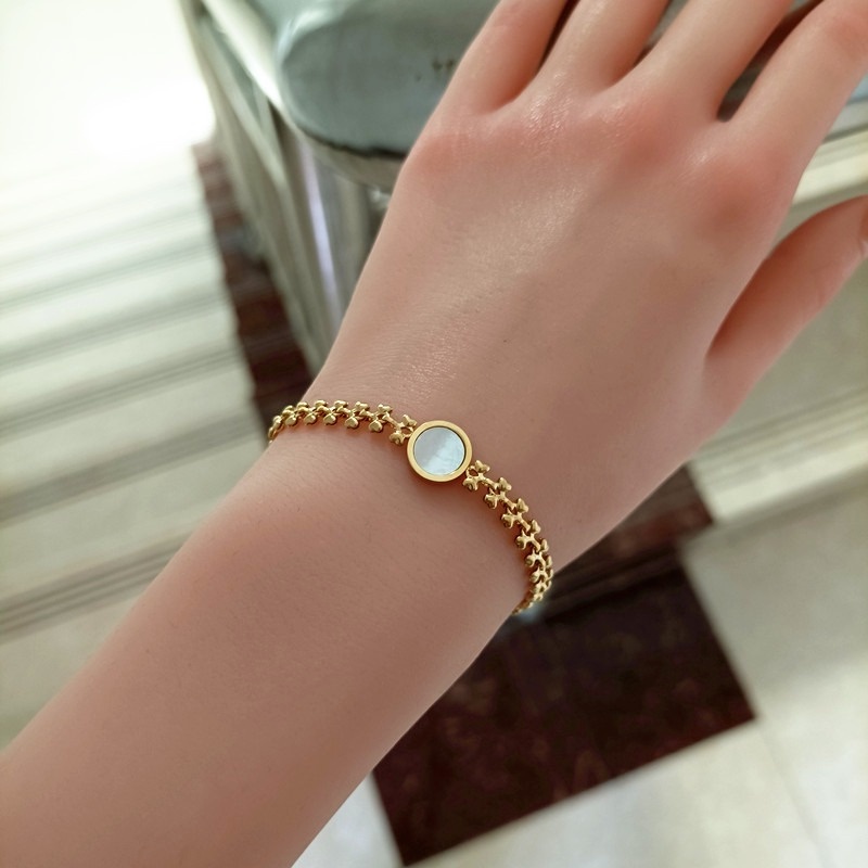 Vòng Đeo Tay Hai Mặt Hình Vỏ Sò Màu Trắng Phong Cách Thời Trang Sang Trọng Dành Cho Nữ