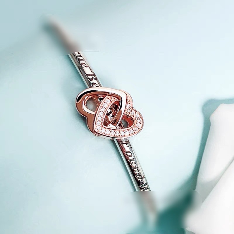 charm pan 2 trái tim vàng hồng đính đá bạc s925