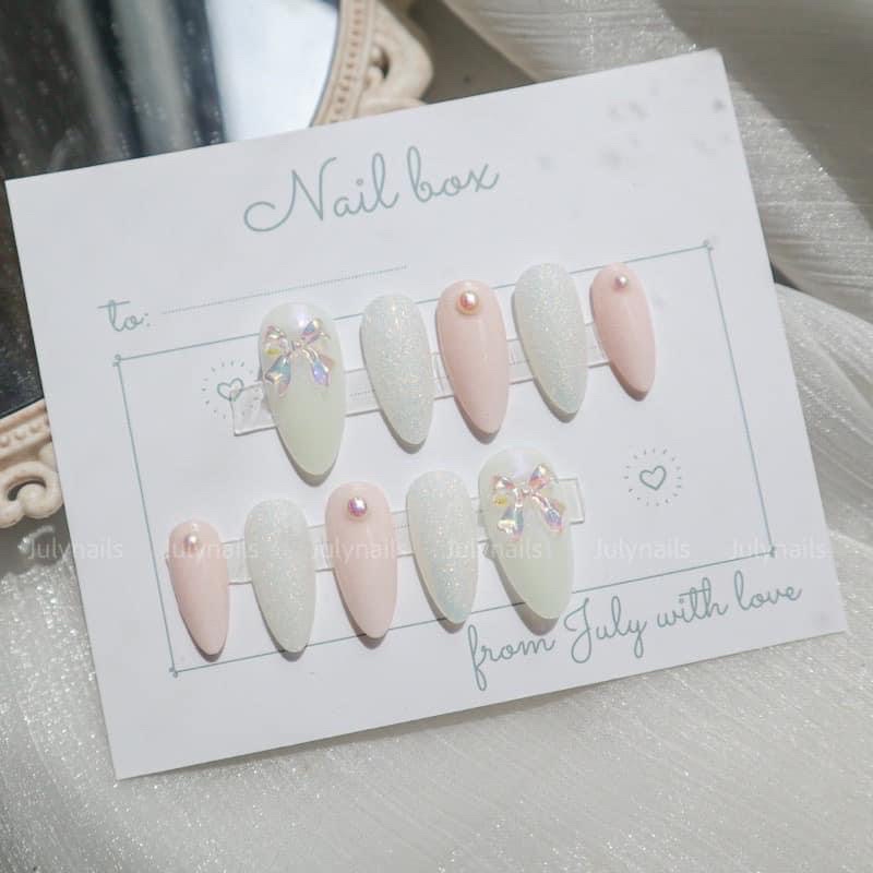 Nail box hồng phấn ngọc trai nơ