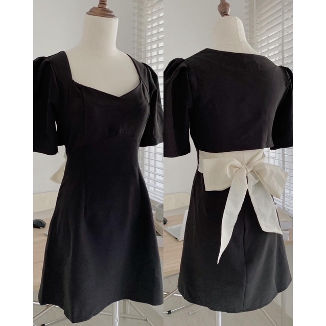 Váy xoè cắt eo nơ sau