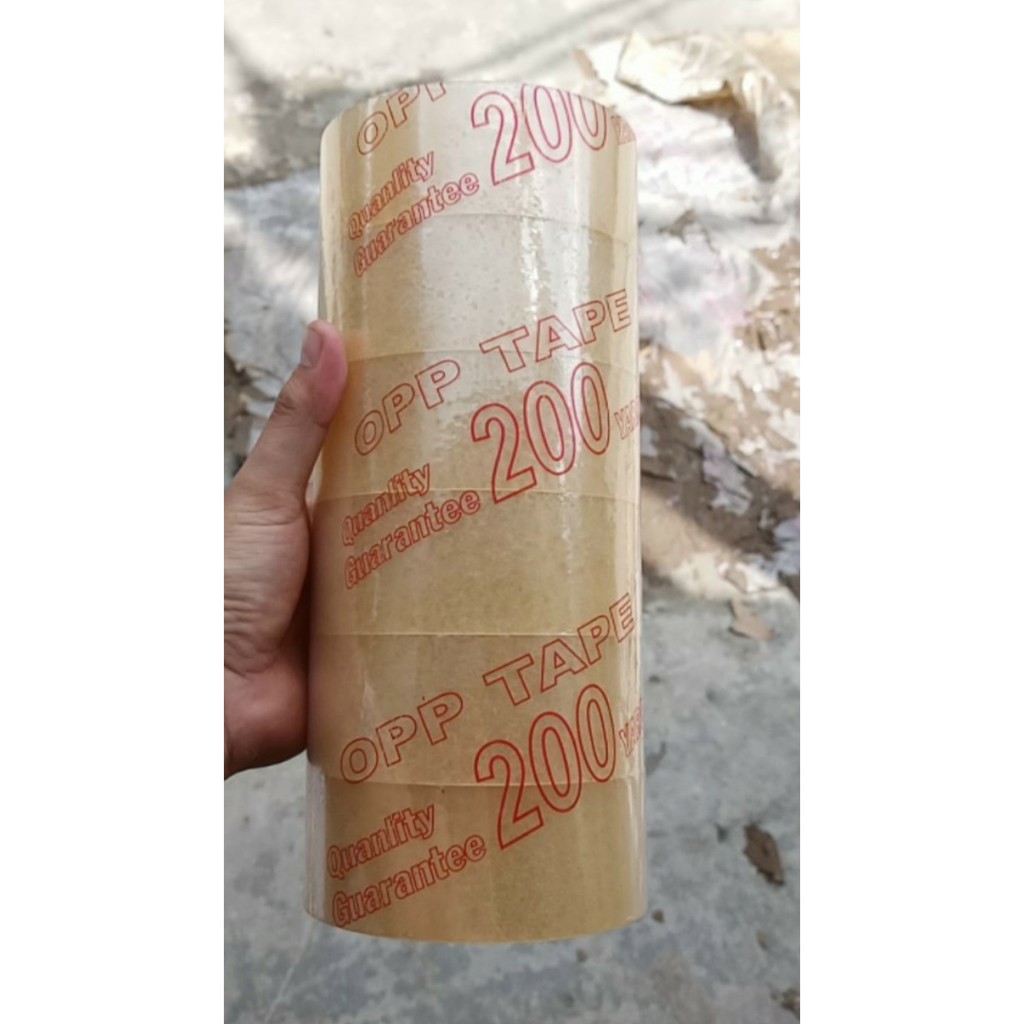 Băng keo trong 200y như hình 1 cây 6 cuộn nặng 1,7kg nhiều keo độ dính cao dẻo dai...!