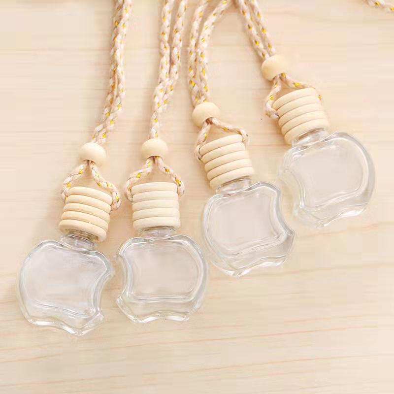 Vỏ chai tinh dầu thủy tinh treo xe hình quả táo nắp gỗ [Giá sỉ/lẻ]