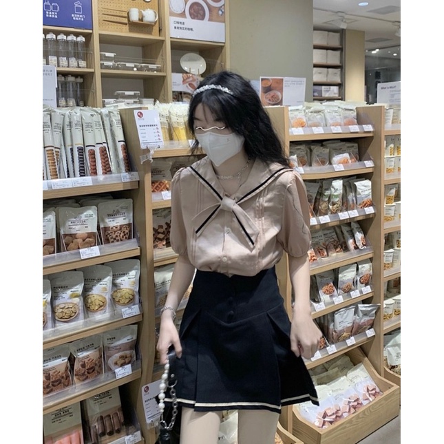 Set áo nâu cổ thùy thủ viền đen kèm chân váy xòe đen viền trắng