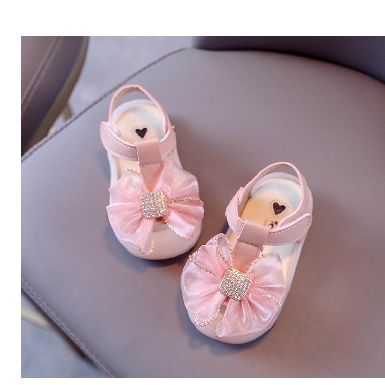 Sandal Nơ Siêu Xinh Mũi Cao Bảo Vệ Chân Bé Cực Mềm Êm Chân