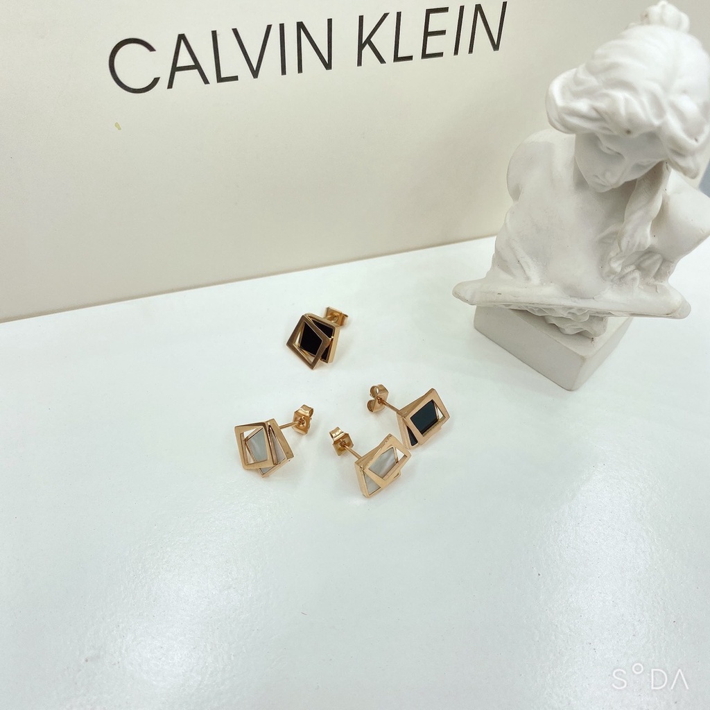 Bông tai nữ titan 2 màu - Cam kết không bay màu