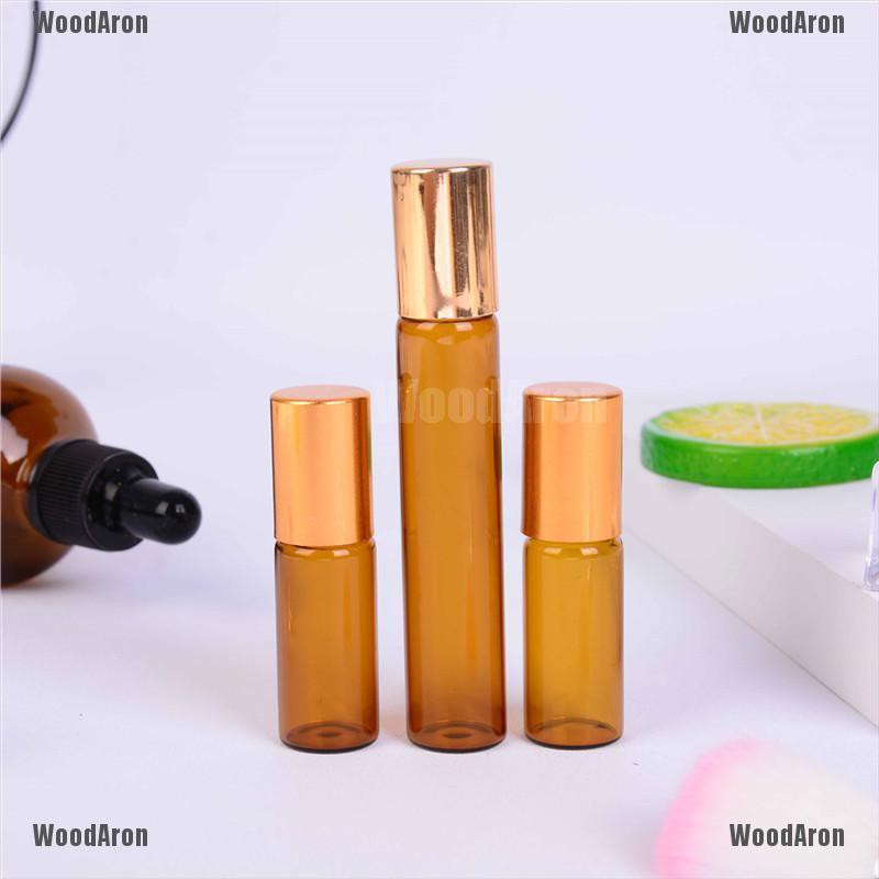 Bộ 5 chai thủy tinh rỗng đựng nước hoa/tinh dầu màu hổ phách 5/10ml | BigBuy360 - bigbuy360.vn