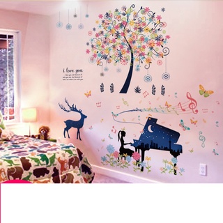Decal dán tường cây sao tuyết và cô gái đánh đàn