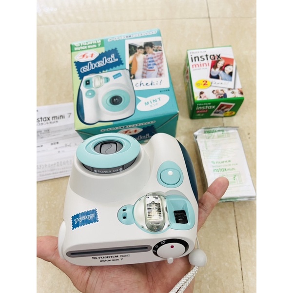 Máy chụp ảnh lấy liền Fujifilm Instax Mini 7 Cheki tặng kèm pin tiểu AA và 1 hộp film 10 tấm date 2024