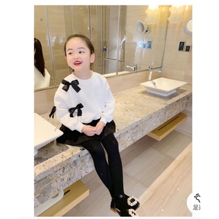Áo da cá gắn nơ nhỏ xinh bé gái