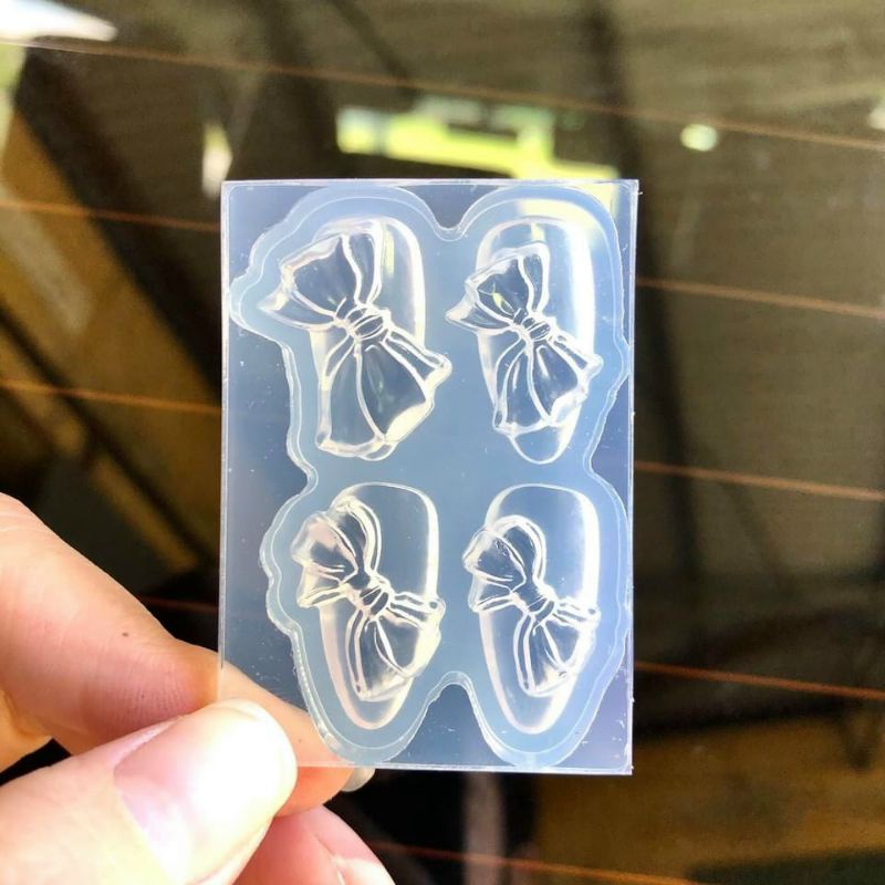 khuôn silicon hình nơ chéo