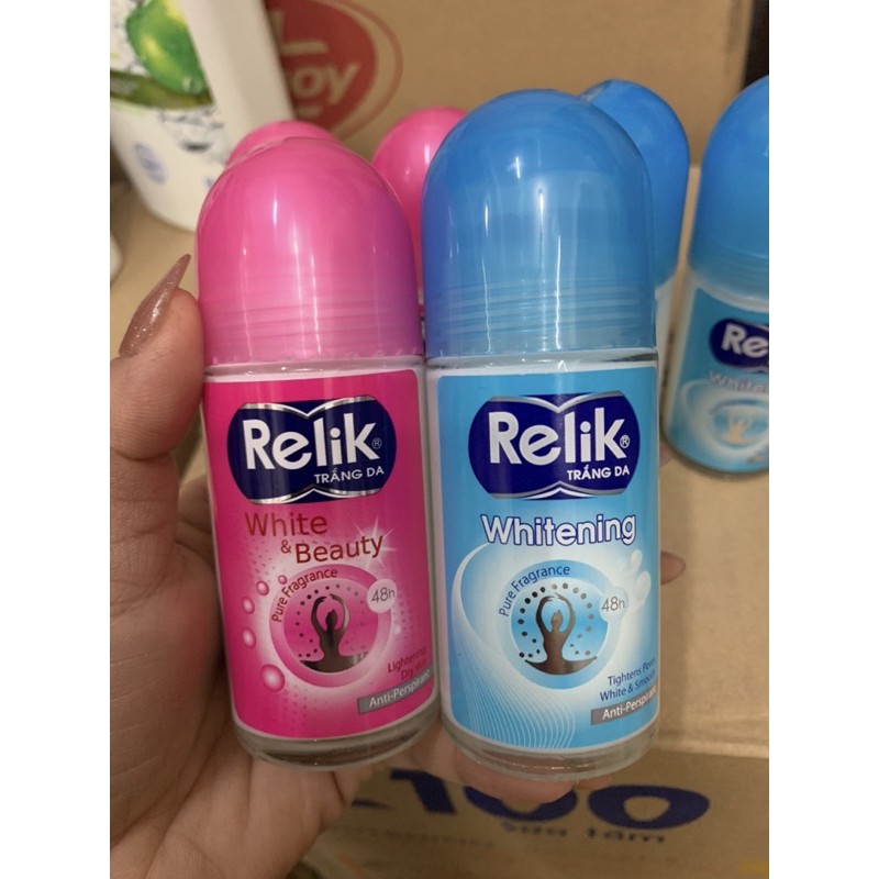 Lăn khử mùi Relik chai lớn 50ml có 2 màu hồng và xanh như hình