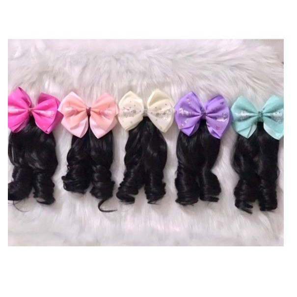 Kẹp nơ tóc xoăn cho bé