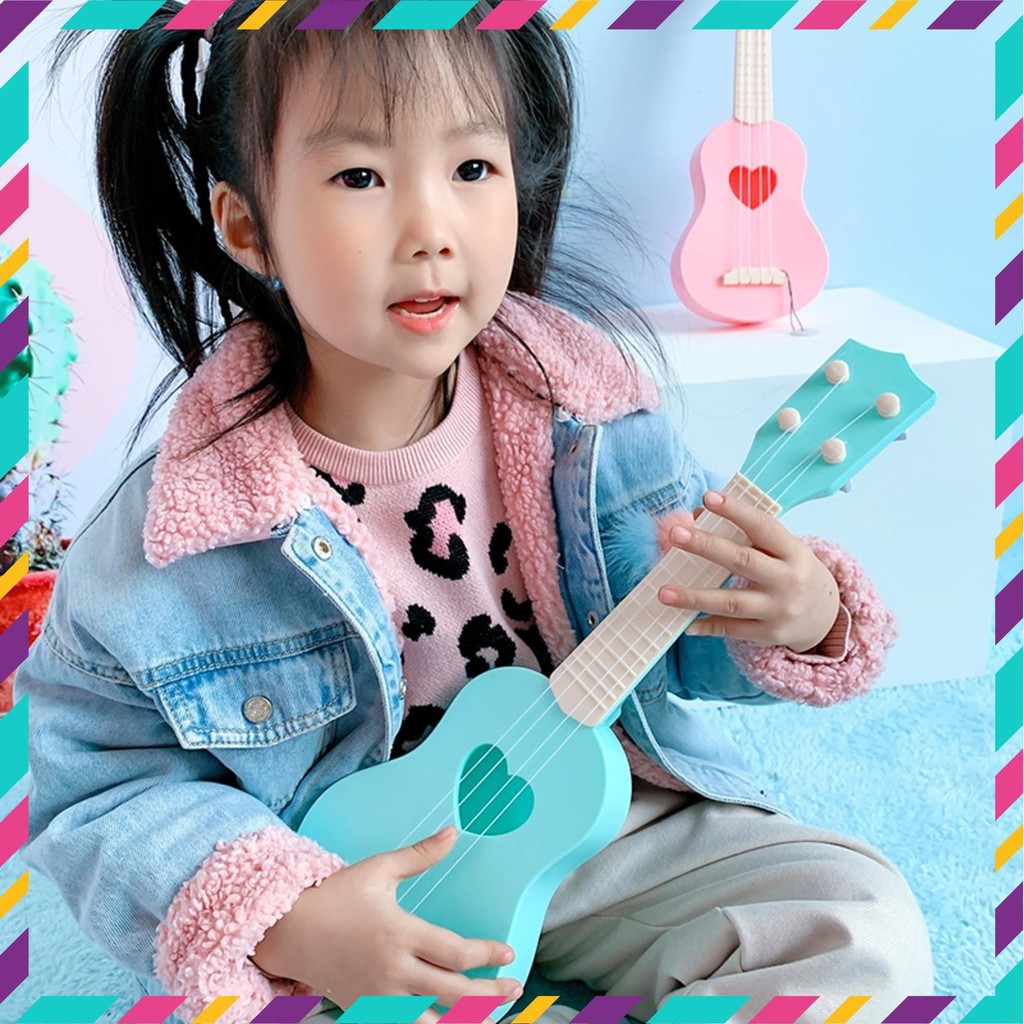 [HOT] Guitar đồ chơi trẻ em màu hồng dành cho bé gái ukulele người mới bắt đầu học chơi đánh đàn 2020