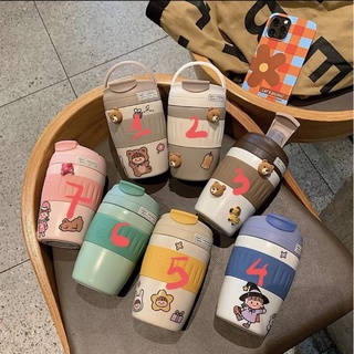 Bình nước gắn sticker siêu cute