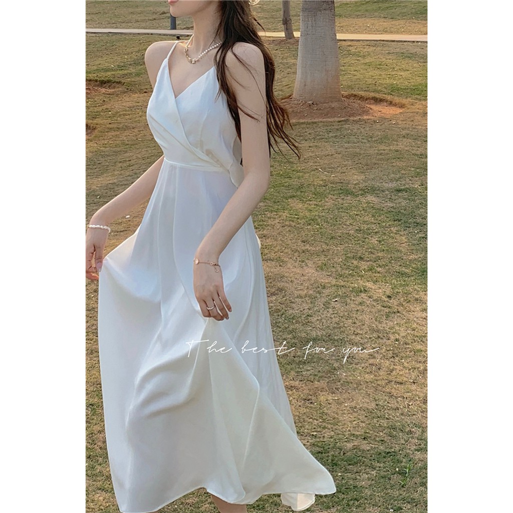 (ORDER) Váy hai dây màu trắng cỏ V thắt nơ sau lưng dây đan chéo nữ tính gợi cảm mùa hè (HÀNG MỚI VỀ)