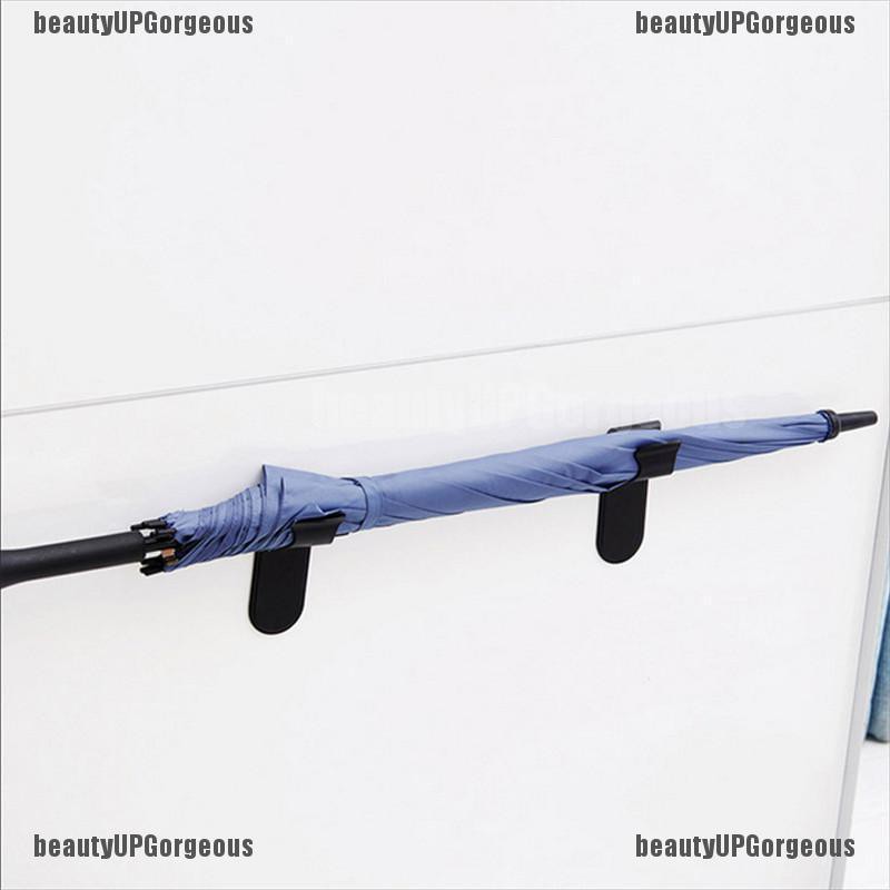 Giá đỡ móc treo dù gắn xe hơi đa năng tiện dụng