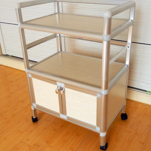 Kệ tủ có bánh xe , khung nhôm , tấm ốp gỗ , hàng đẹp dễ ráp , nhận sỉ và giao hàng toàn quốc ...........................
